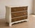 Description A beautifully refinished vintage French Provincial dresser featuring a warm sculpted cream finish paired with...