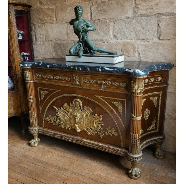 Important Louis XV style mahogany commode with gilt bronze mounts and black marble top An exceptional Louis XV style...