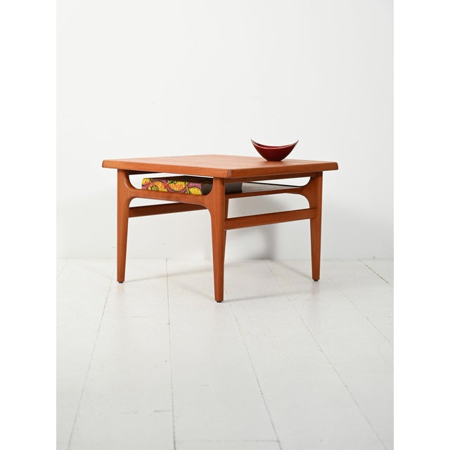 Danish coffee table from the 1960s in solid teak with soft forms typical of Nordic modernism. Danish coffee table from the...
