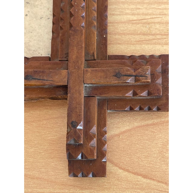 Antque Austrian hand carved wood tramp Art photo frame for inside size 4” by 6”.