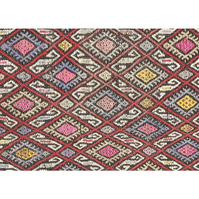 Bring a unique and traditional style to your home with this handcrafted Vintage Turkish Kilim. Boasting a classic wool-on-...
