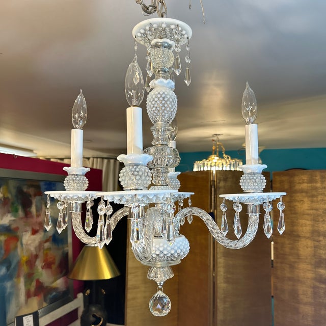 Sparkling crystal hobnail chandelier with dangling crystals and a faceted crystal ball as the bottom finial. The...