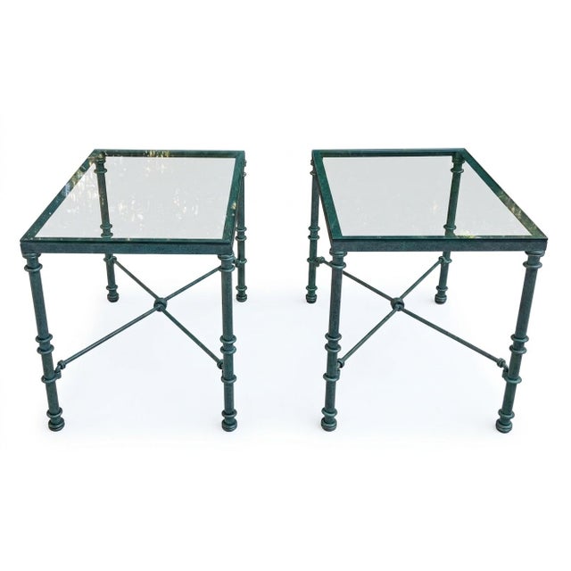 A pair of verdigris finish rectangular wrought iron side tables in the style of Giacometti.