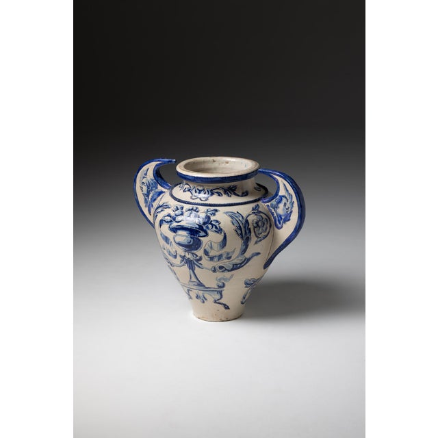 19th-century Spanish faience pot from Talavera de la Reina, decorated in the characteristic polychrome style of the...