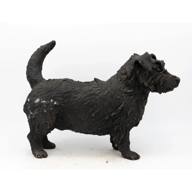 This Mid-20th century bronze sculpture is a delightful representation of a Scottie Dog or Scottish Terrier, capturing the...