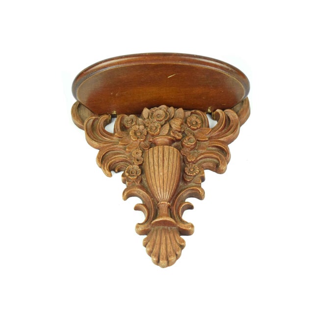 Add a touch of vintage elegance to your walls with this ornate wall bracket, featuring a classic French inspired floral...