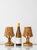 Small enough for a nightstand and woven entirely from natural materials, this pair of bamboo-and-rattan lamps is pure mid-...