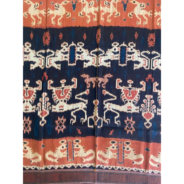 This Ikat textile originates from the Island of Sumba, Indonesia. It is hand-woven using naturally dyed yarns via a method...
