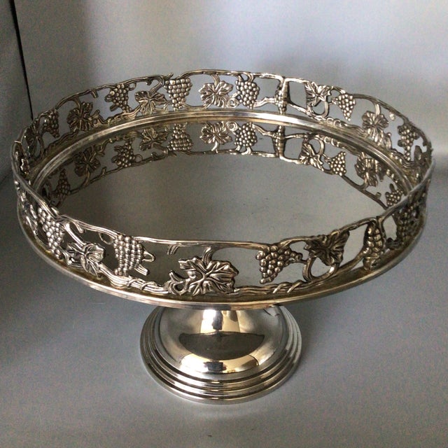 Vintage silver plated cake pedestal server. Serve your next cake or dessert on this raised edged silver round platter....
