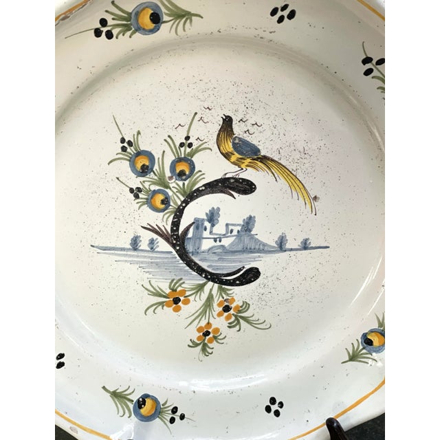 This is such a lovely plate with scalloped edges. The colors are bold and beautiful and the plate was made in Nevers, France.