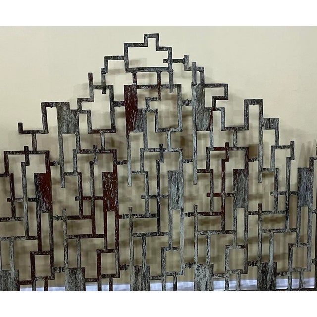 Elegant fireplace screen made of cast iron, artistic motif of Cityscape and very interesting patina make the fireplace...