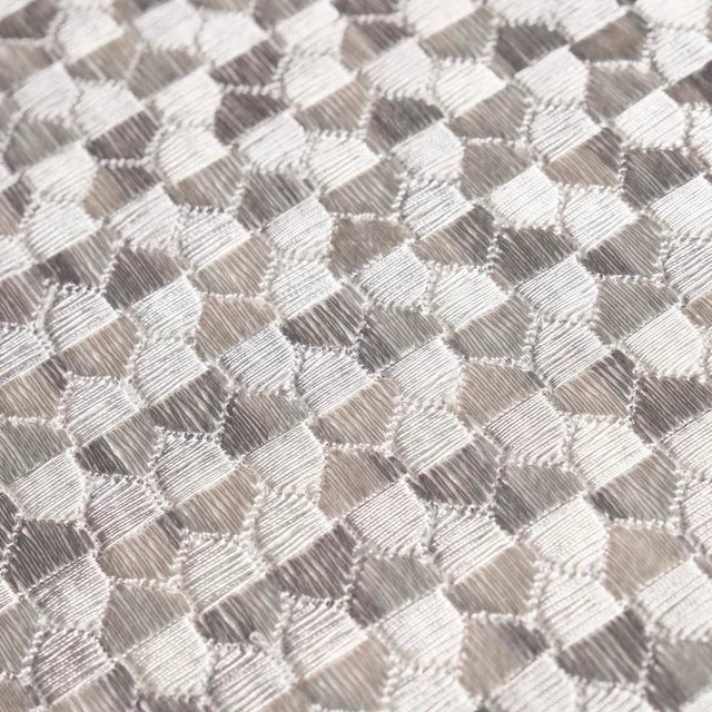 Ivins Embroidery in gray is a fabulous full-coverage geometric pattern rendered in tonal yarns and dense multidirectional...