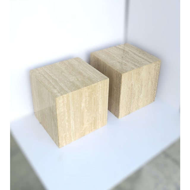 A substantial pair of Italian travertine marble end or side tables, Modern style/Postmodern period, circa late 20th...