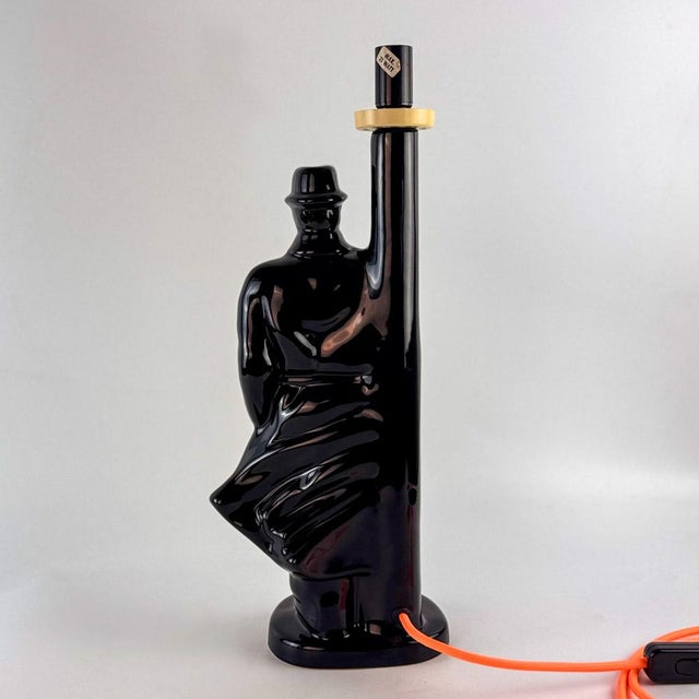 Black agent, detective ceramic table lamp designed by buthe keramik, circa 1980, with a striking postmodern silhouette. I...