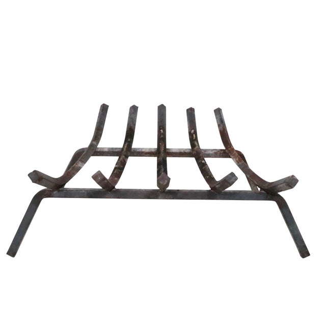 Mid Century wrought iron fireplace insert grate, log holder. Constructed of heavy gage sold iron, this example is in very...