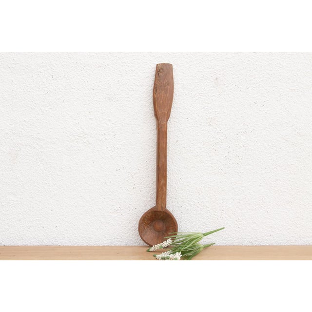 There is something deeply soulful about a simple wooden spoon—especially one carved by hand to feed a village. This...
