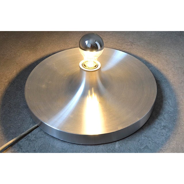 Wall/ceiling light in the style of Charlotte Perriand. In 1968, Perriand designed these wall/ceiling lights for a winter...