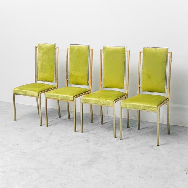 Set of 4 chairs. Silver and gold-colored metal frame. Green velvet seat and backrest. Good condition. Signs of wear on the...