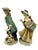 Classic Gallery by Napco Colonial Figurine Pair Dressed in period attire, the male figure has a dog and the female figure...
