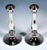 Two festive biedermeier silver candlesticks on a round, smooth raised base with a smooth, baluster-shaped shaft, with...