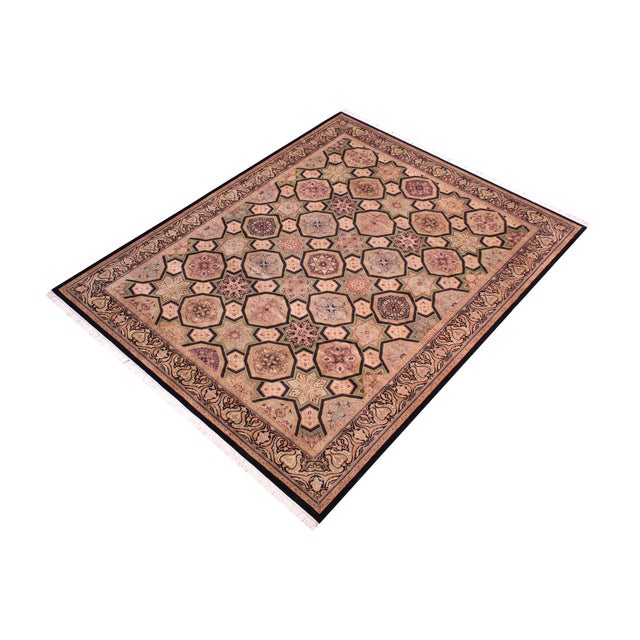 Designed with mesmerizing intricacy and gorgeous color palette, this hand-knotted masterpiece demonstrates the beauty and...