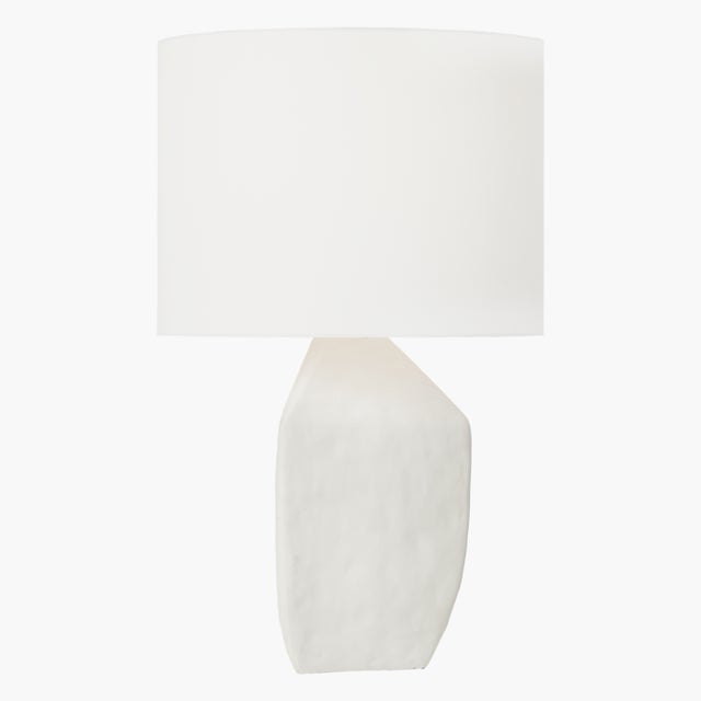 The Sybert one-light table lamp by Hable is crafted with precision, and the ceramic base showcases artisanal...