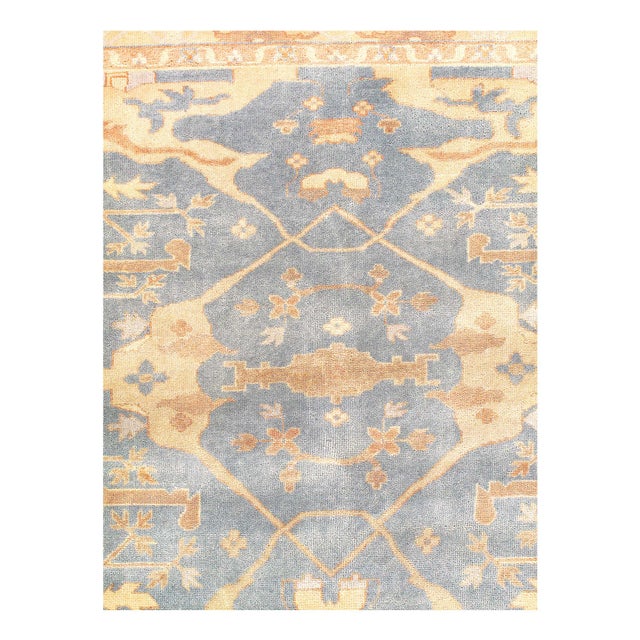 This Oushak Hand-Knotted Wool Teal Area Rug celebrated for its understated elegance, Every Oushak reproduction is hand-...