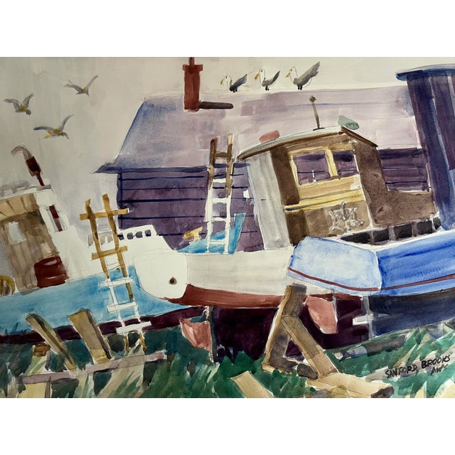 An original vintage modernist watercolor of fishing boats in a boat yard by Sanford Brooks signed lower right and noted...