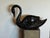 Elevate your space with this magnificent, oversized black ceramic swan. Standing 13" high and 20" wide, this is a rare,...