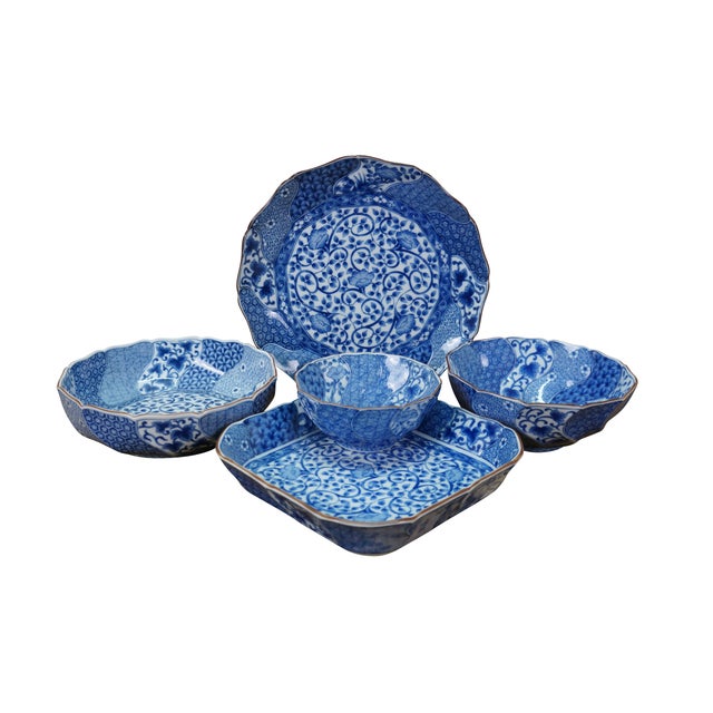 Vintage Japanese Minoyaki Nejiri Shouzui porcelain serving pieces featuring a distinctive blue and white arabesque...