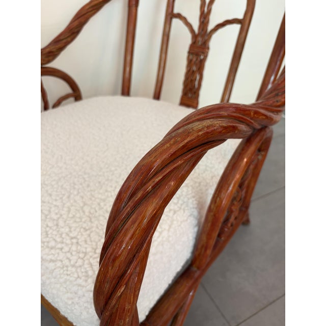 Incredible pair of rattan armchairs from the 1970s. The rattan weaving is remarkable on these beautiful, sculptural...