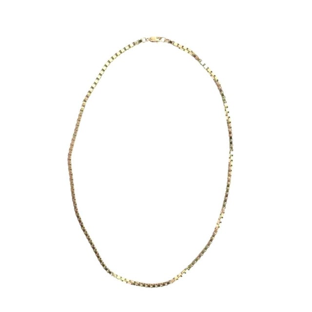 Vintage 14K Yellow Gold Box Chain Necklace. Necklace features the distinctive box link design, prized for its sleek...