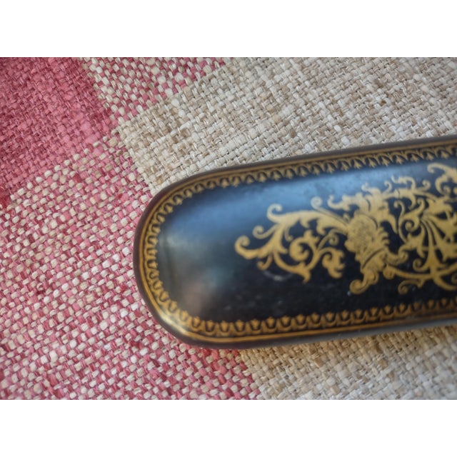 Offered is a lovely Victorian papier mache eyeglass holder from the turn of the century. It measures 6" by 1 1/2" and is...