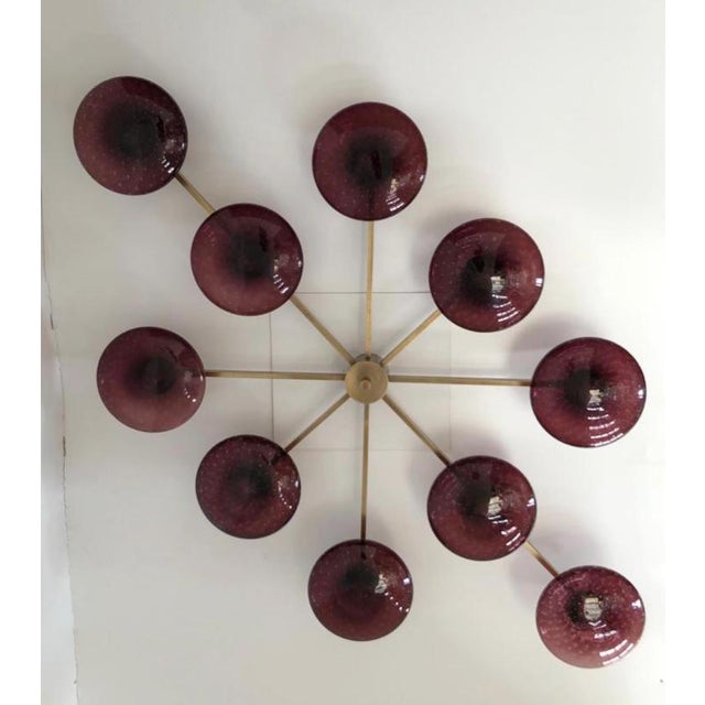 Italian midcentury flush mount with ten amethyst Murano glass shades carefully hand blown with bubbles inside the glass...
