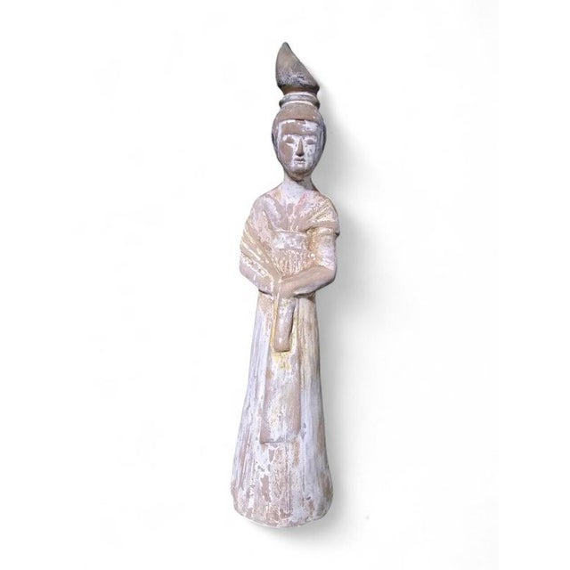 This elegant Chinese terracotta sculpture, crafted in the 20th century, portrays a graceful court lady, a timeless symbol...