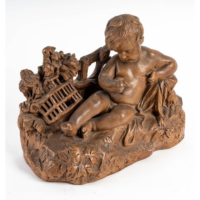 Terracotta Figurine of Child with Bird For Sale - Image 10 of 12