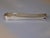 A dainty and mid-century simple pair of sugar cube tongs. These were made for saccharin tablets which are still made...