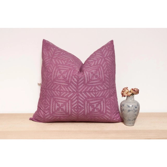This vibrant decorative pillow cover features beautiful array of patterns, with hand crafted appliqué cut work, giving it...