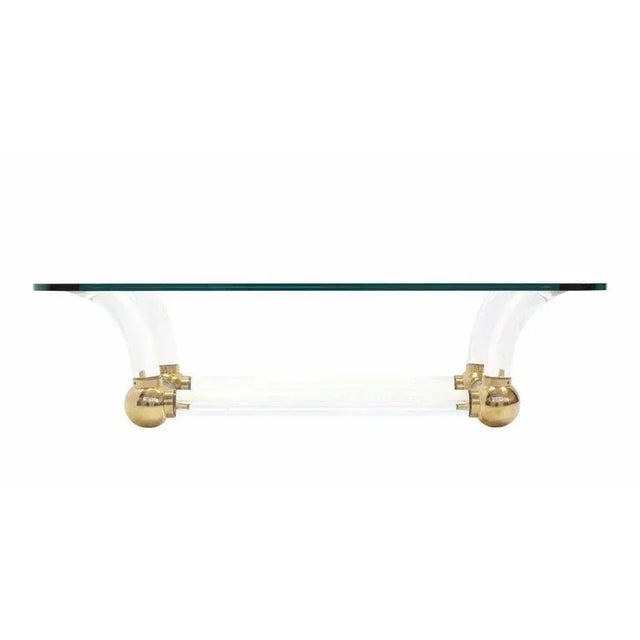 Early 20th Century Hollywood Regency Lucite and Brass Base Thick Glass Top Coffee Table For Sale - Image 5 of 9