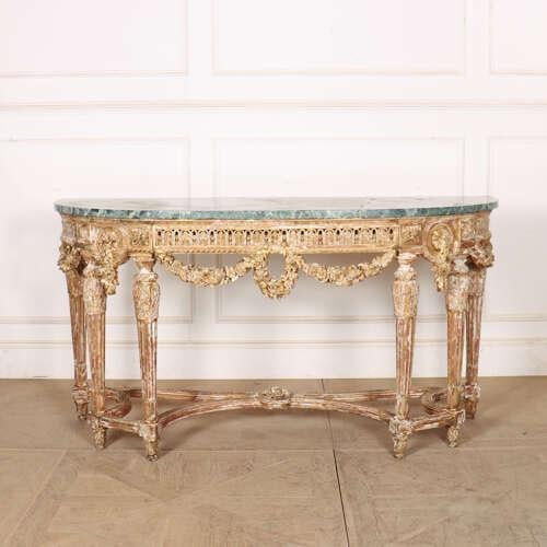 Wonderful 19th century French painted and gilt console table with good carved wood decoration. 1860. This piece is...