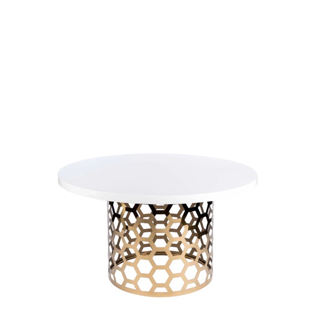 Laguna round dining set in ivory and gold. Table: Materials: Stainless steel, wood Measurements : 54"w x 54"d x 30" h, 85...
