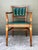 Bring a touch of Mid-Century elegance to your workspace with this sophisticated Art Deco-style armchair. Expertly crafted...