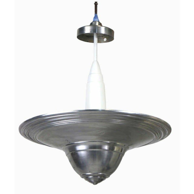 A very stylish set of four Machine Age Modernist Industrial pendant lights by Westinghouse Electric & Mfg. Co. USA the...