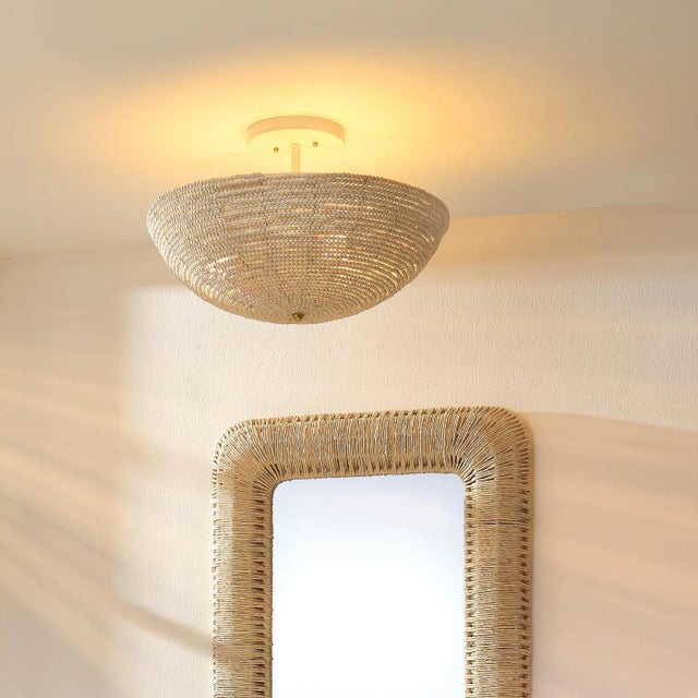 Influenced by both driftwood chunks and beads of beach glass, this design brings elements of each to this lovely ceiling...