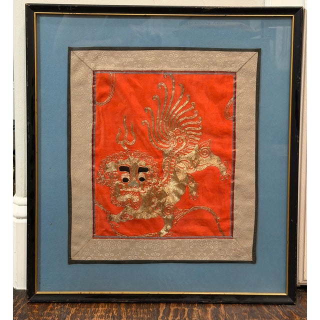 A striking antique Chinese embroidered textile fragment, believed to date to the Qing dynasty, likely 19th century,...