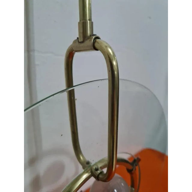 Chandelier 2 lights 1950s brass and glass Fontana Arte. Up to 250V (Europe/UK Standard).The wiring of this item may be...