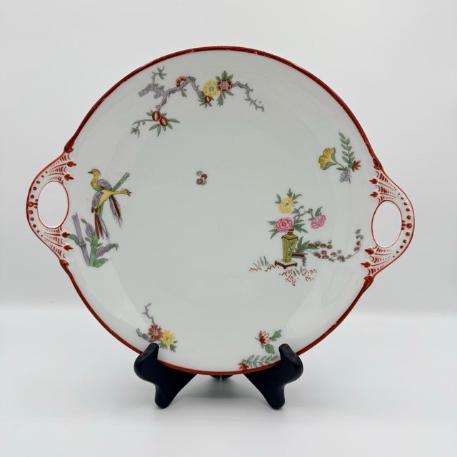 A small French dessert service with an unexpectedly modern mix of delicacy and color, this antique Limoges set pairs fine...