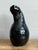 This captivating contemporary studio pottery vase is a sophisticated study in asymmetrical form and fluid design. Hand-...