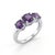This elegant ring features three round-cut amethyst gemstones, each showcasing a stunning deep purple hue that embodies...