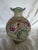 A late 19th C Japanese double handles Moriage porcelain vase featuring hand painted pink and purple rose medallions...